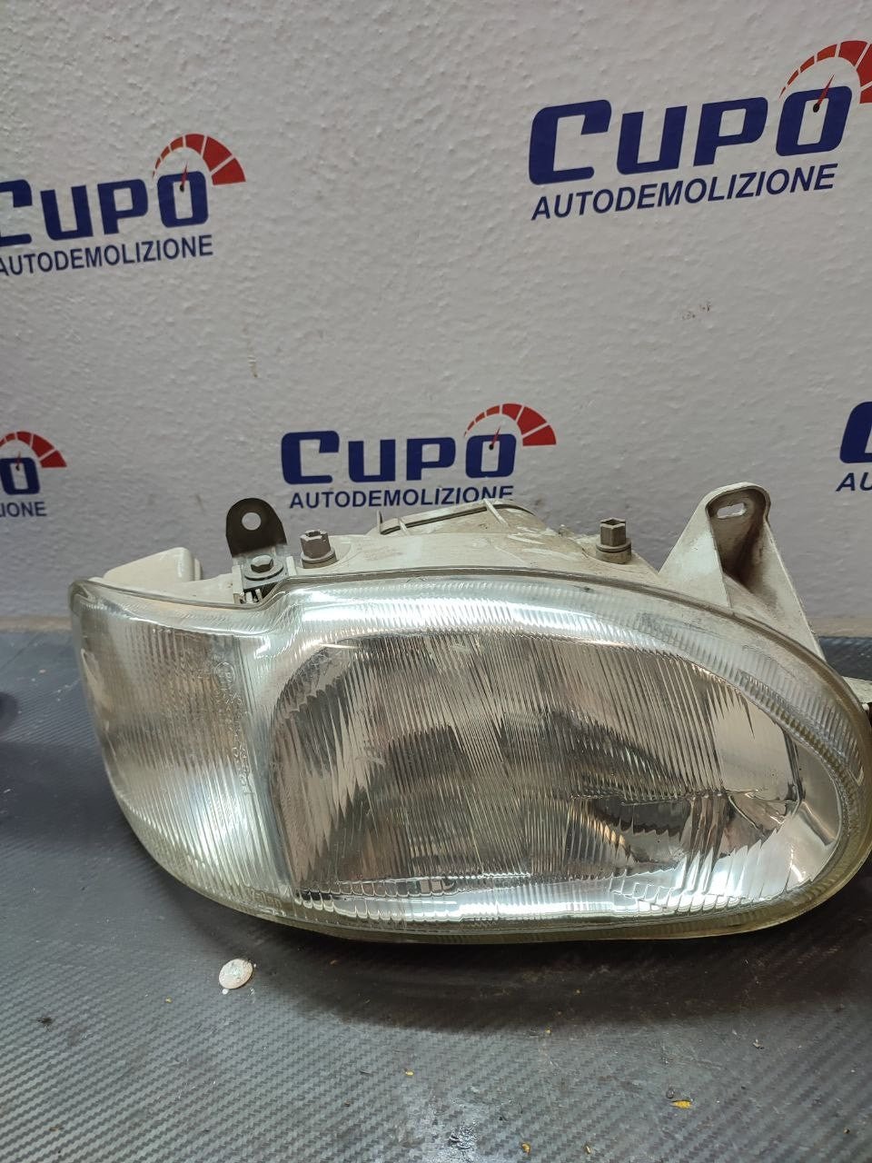 Faro / Fanale anteriore destro Ford Escort '95 cod 13k060aa